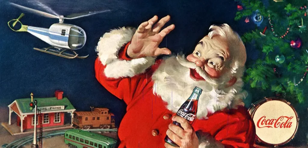Άγιος Βασίλης Coca-Cola σε vintage διαφήμιση Χριστουγέννων κρατώντας μπουκάλι Coca-Cola μπροστά σε χριστουγεννιάτικο δέντρο